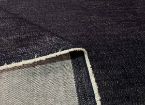jean lycra noir chiné en 1.60 m de large