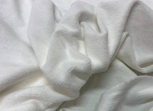 Maille éponge de confection blanche