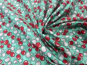 Popeline de coton turquoise imprimé pommes en 1.45L