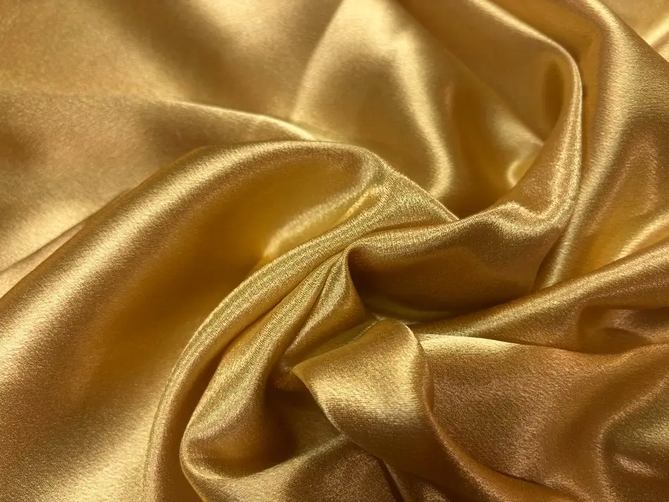 Crêpe satin doré stretch pour blouse femme élégante