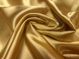 Crêpe satin doré stretch en 1.50L